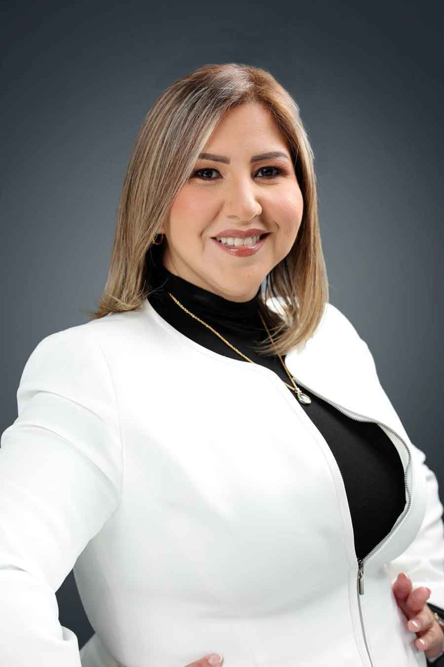 Carla Victoria Rodríguez, Real Estate Agent